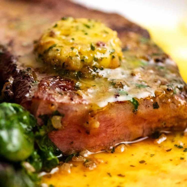 Close up of Cafe de Paris melting on steak