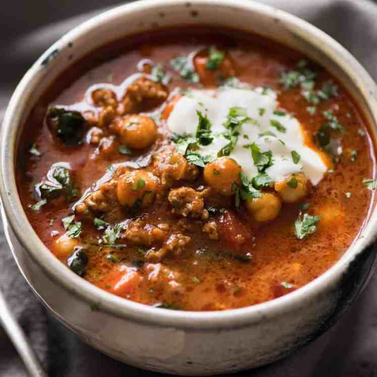 A chickpea soup exploding with flavour! Tastes like Chicken Shawarma in soup form with lamb, quick to make, nutritious and filling. recipetineats.com
