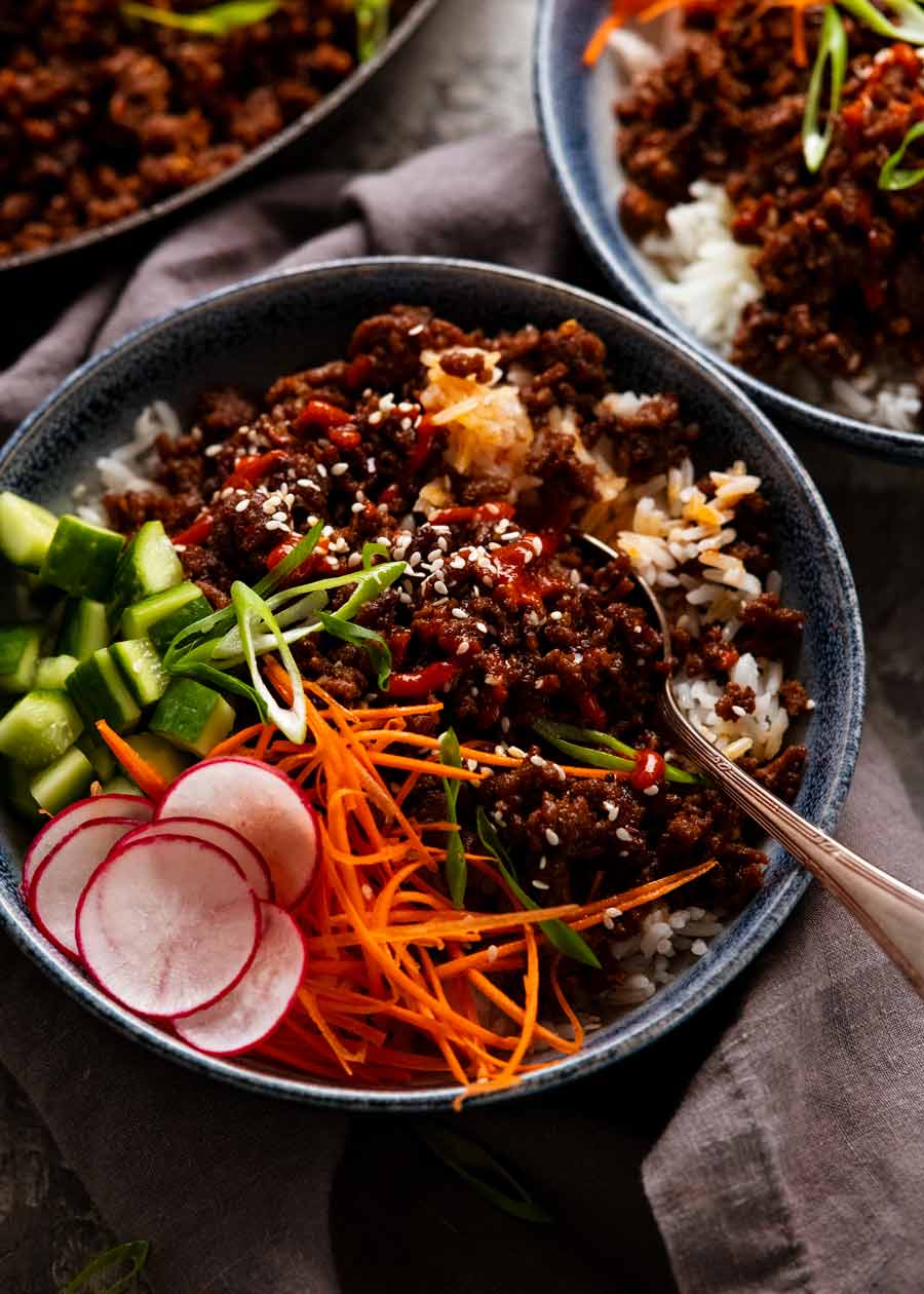 Firecracker beef in a bowl over rice