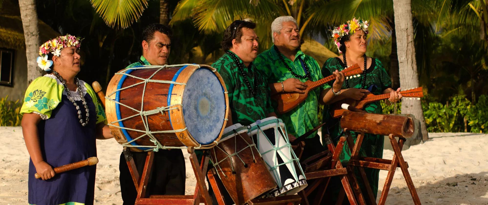 Group of Polynesian Pacific Islanders band plays Tahitian music