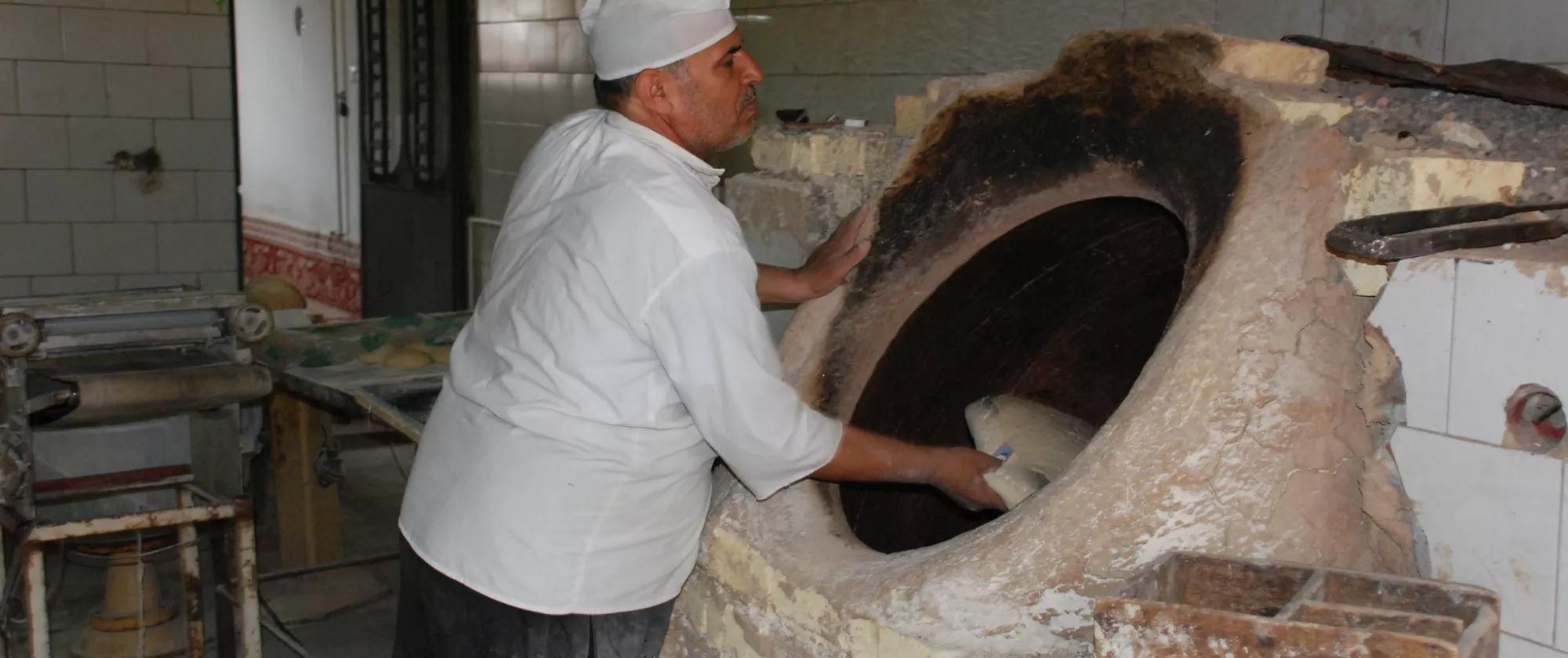 A baker at work in Iran