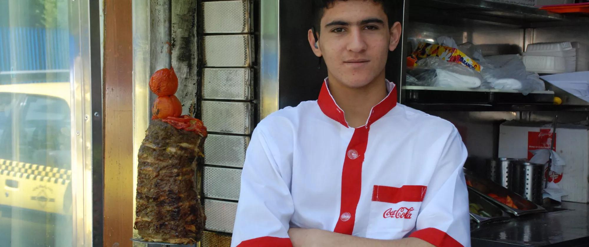 A kebab vendor outside his shop in Iran