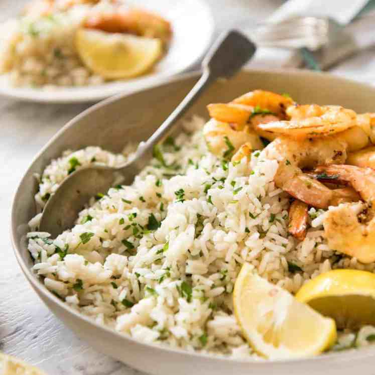 This Lemon Rice Pilaf is so delicious, it can be eaten plain! Lovely bright fresh lemon flavours with herbs. www.recipetineats.com