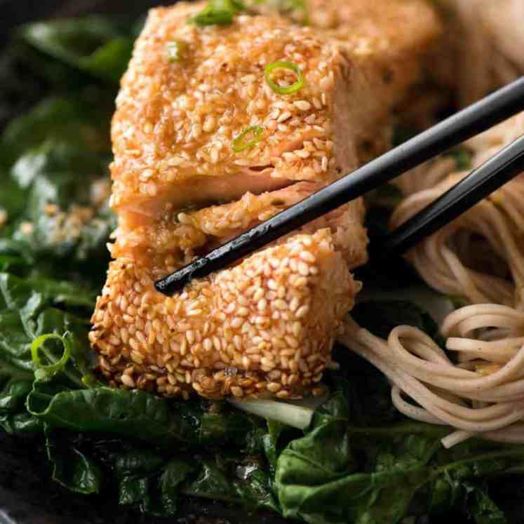 Just roll the salmon in sesame seeds, drizzle with oil and bake! You'll be amazed how well the sesame adheres to the salmon and love how crispy this Sesame Salmon comes out!