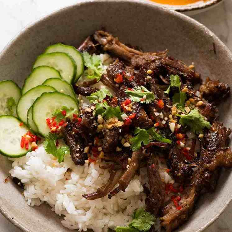 Caramelised Vietnamese Shredded Beef in a bowl with Nuoc Cham on the side
