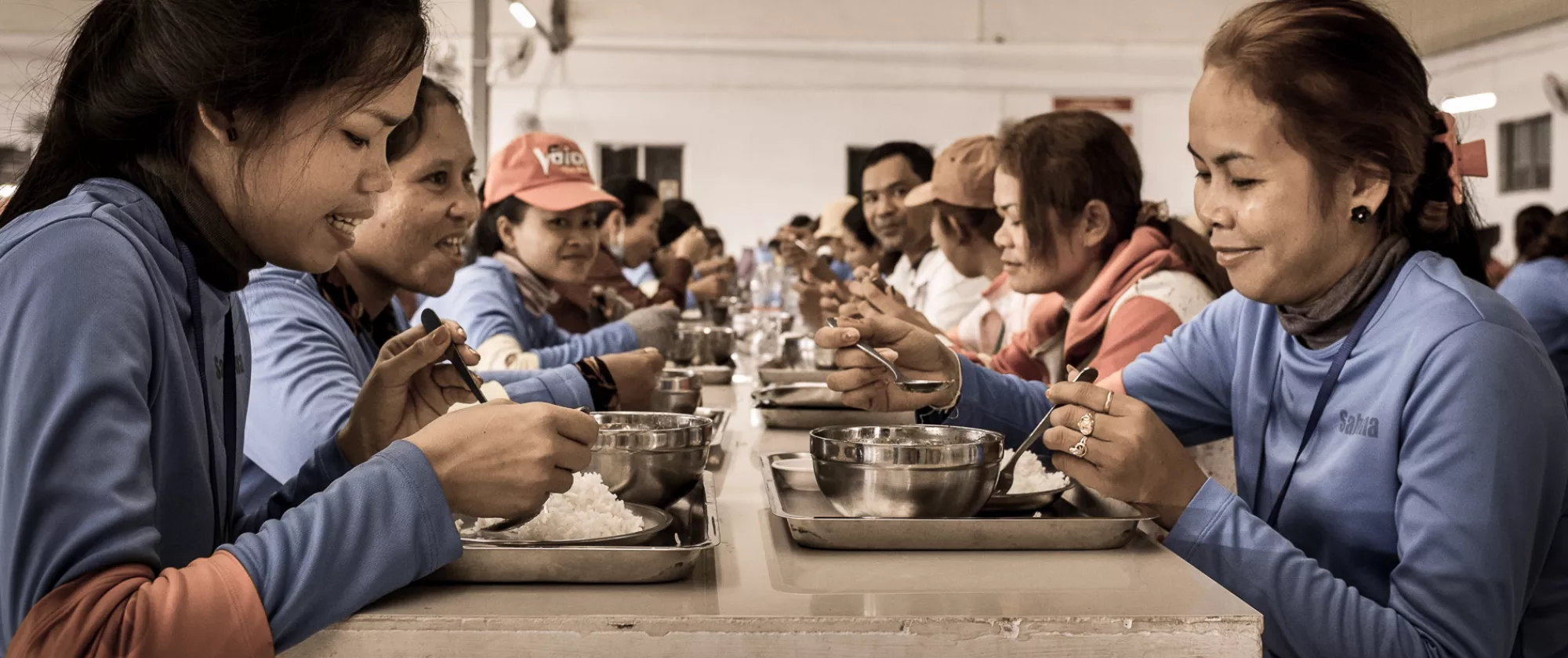 Cambodia garment workers enjoy their lunch