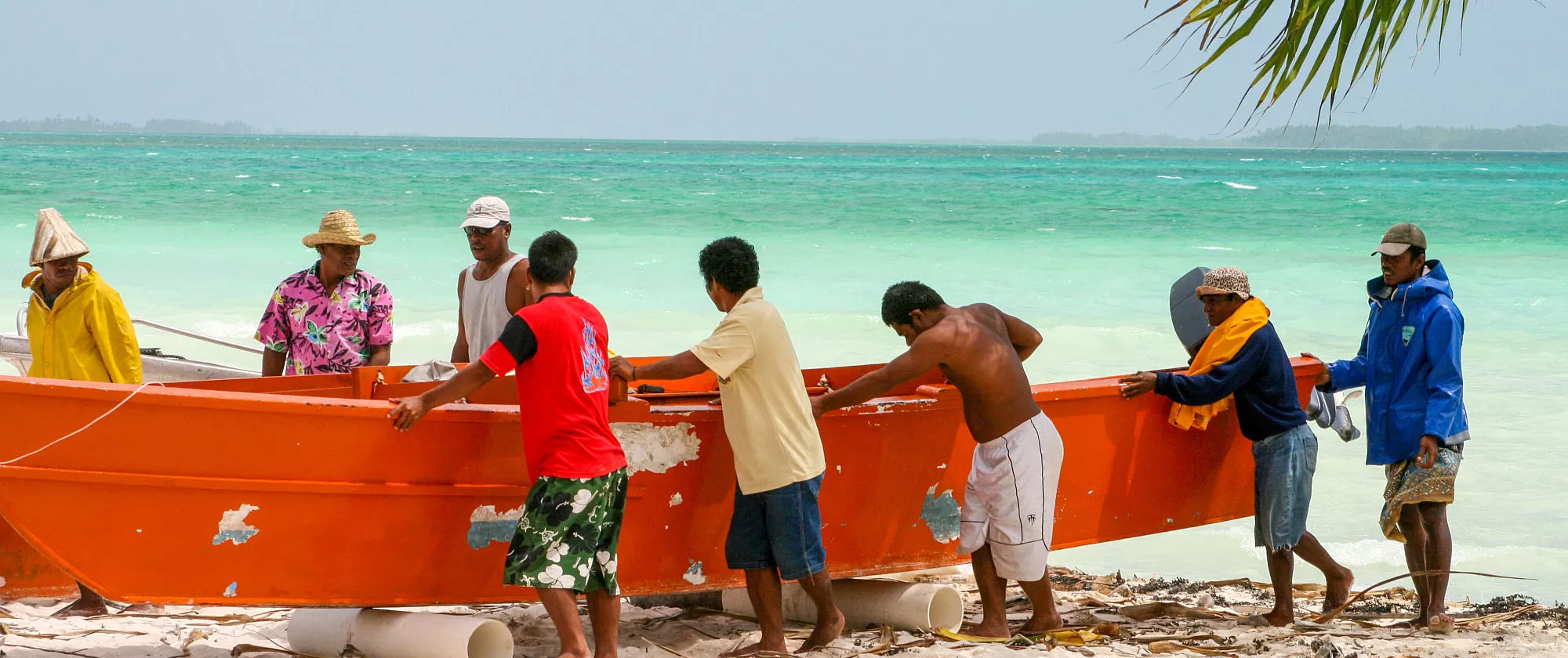 A group of men coming back from fishing at Tabuaeran Island of the Republic of Kiribati