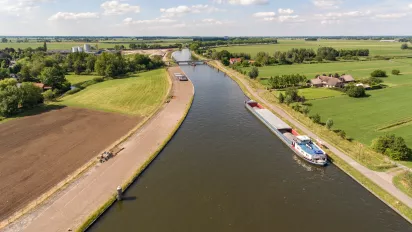 Aerial shot of the Merwede canal near the Arkel village located in the Netherlands.